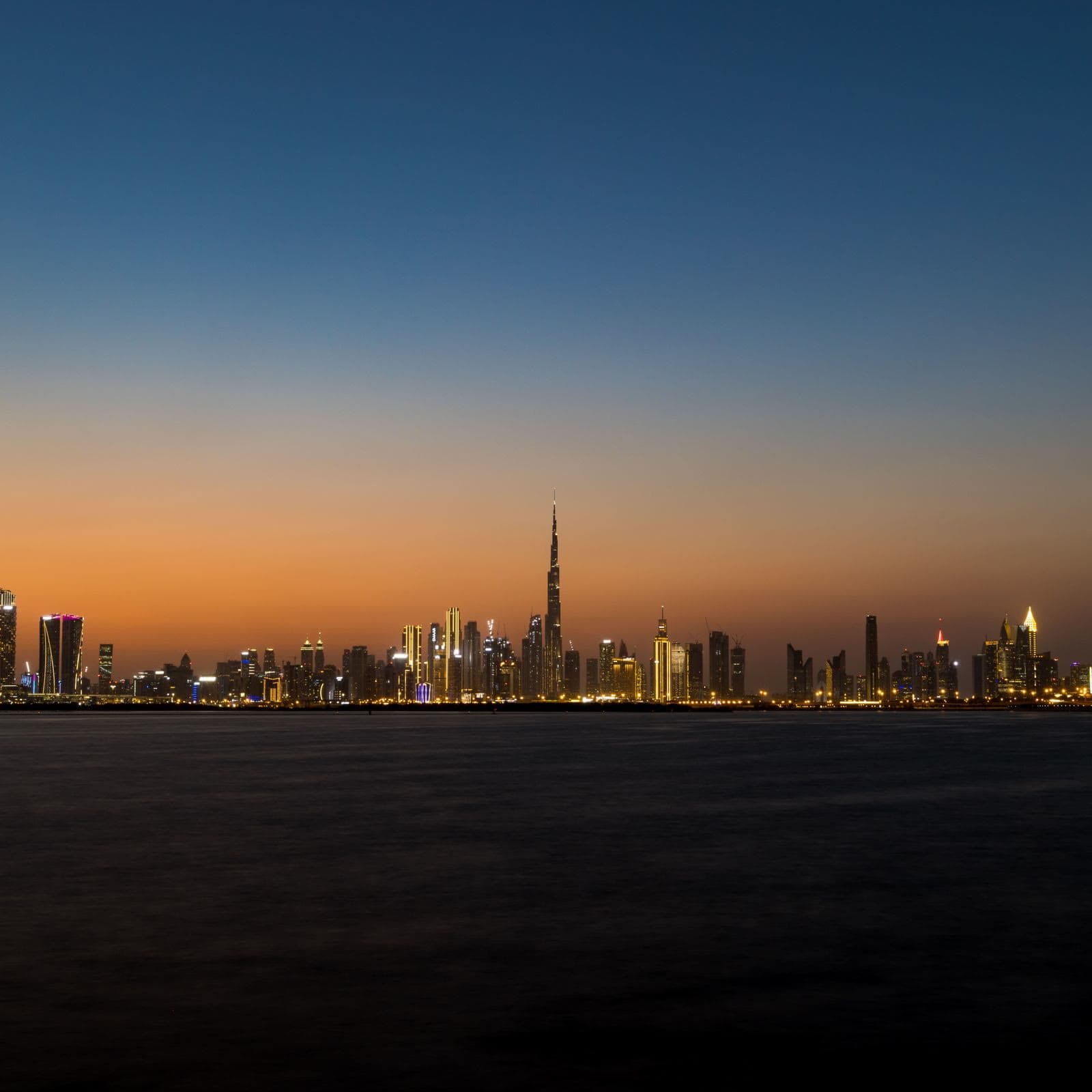 The Dubai skyline at dusk — the in-region infrastructure sovereign voice AI runs on